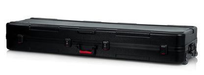 Gator Cases Molded Flight Case for Deep 88-Note Keyboards with TSA Approved Locking Latches and Recessed Wheels; (GTSA-KEY88D),Black