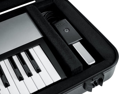 Gator Cases Molded Flight Case for 49-Note Keyboards with TSA Approved Locking Latches and Recessed Wheels; (GTSA-KEY49)