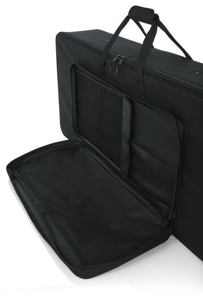 Gator Lightweight Case with Retractable Pull Handle and Wheels Fits Standard 49 Note Keyboards and Electric Pianos (GK-49)